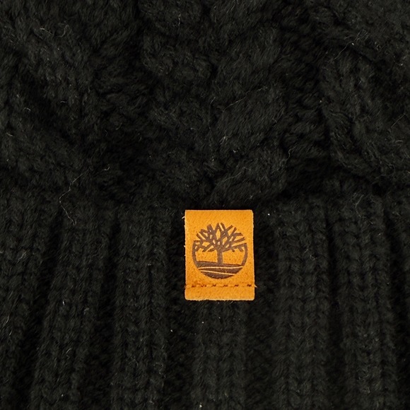 Timberland Womens Black Cable Knit Fleece Lined Beanie Hat with Pom Cozy NEW - Picture 2 of 7